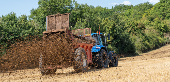 Image of Muck spreading farm tractor